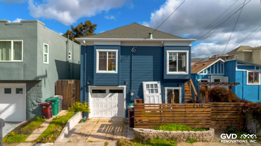 Home exterior showcasing James Hardie Evening Blue siding and Arctic White trim in Oakland, CA