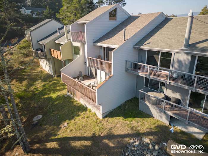 Pearl Gray James Hardie lap siding on a unique home exterior in Mill Valley, highlighting a modern transformation