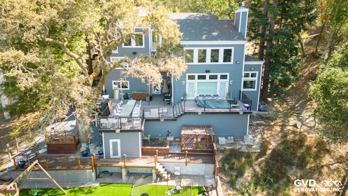Home exterior featuring Night Gray James Hardie siding with Arctic White trim and large deck in Orinda, CA