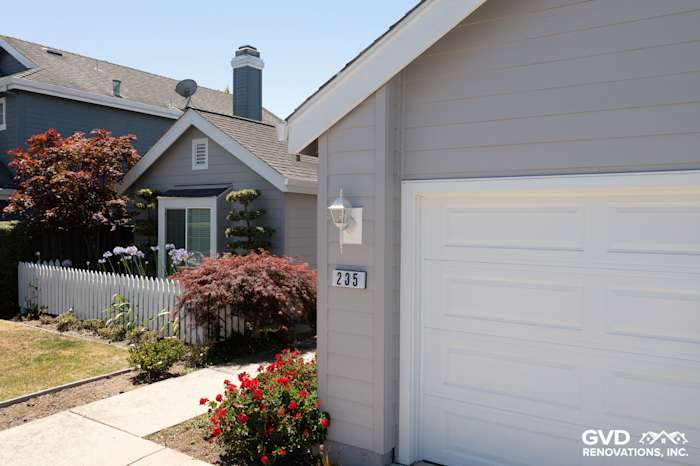 Pearl Gray James Hardie Plank Lap Siding with Arctic White HardieTrim on a home in Foster City, California