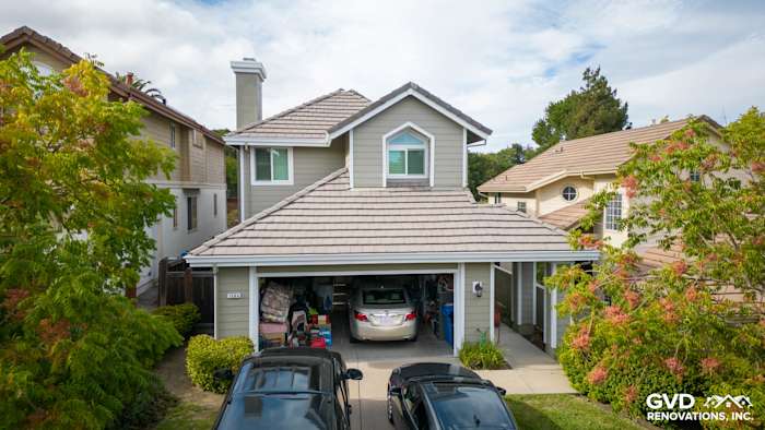 James Hardie Lap siding in Monterey Taupe with Arctic White trim on a Danville home exterior