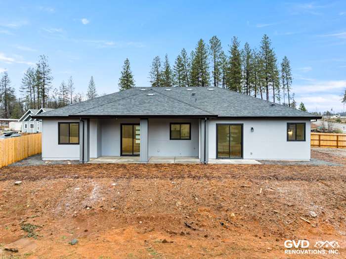 New construction home exterior in Paradise featuring James Hardie Architectural Panels and black Milgard windows