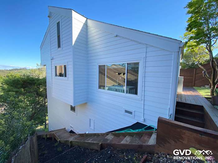 Newly installed pre-finished James Hardie lap siding on Mill Valley home, showcasing a modern exterior design