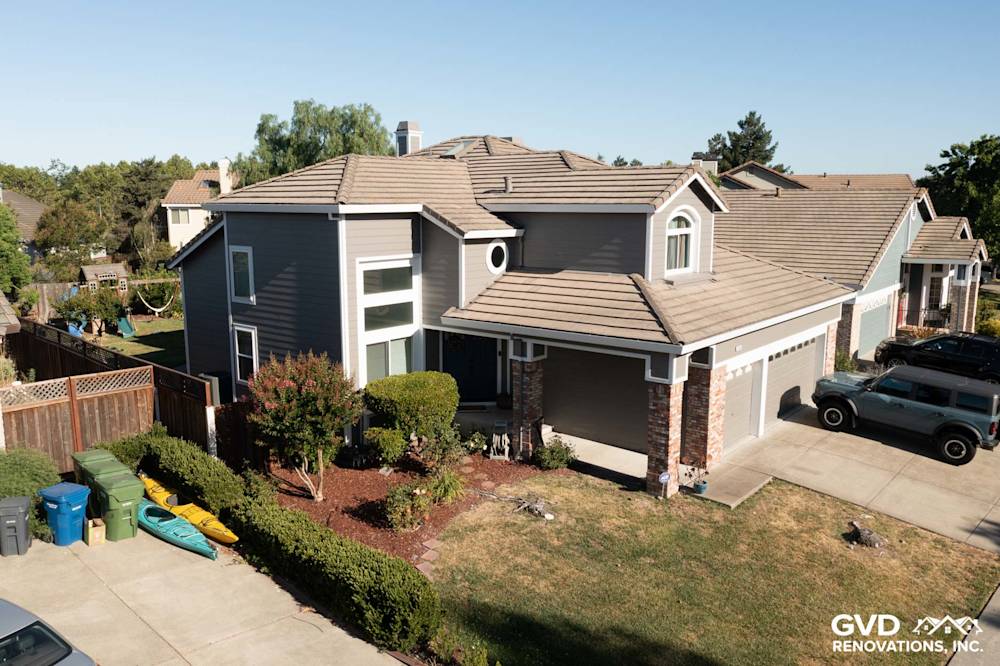 Home exterior featuring James Hardie lap siding in Aged Pewter and new Alside Mezzo vinyl windows in Petaluma