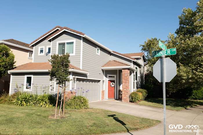 Home exterior featuring Gray Slate James Hardie siding, Milgard vinyl windows, and Arctic White trim in Petaluma
