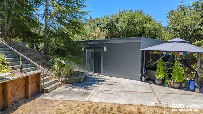 Home exterior featuring James Hardie Night Gray siding, modern design, and custom-painted trim in Lafayette, CA