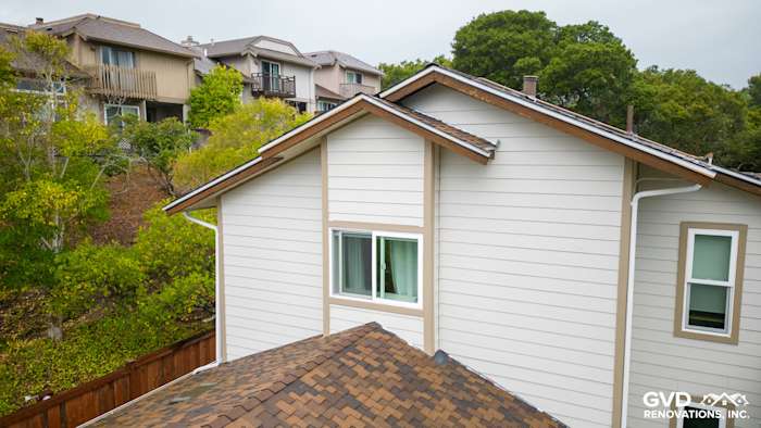 New James Hardie Cobble Stone siding and Khaki Brown trim on a home exterior in San Mateo, CA