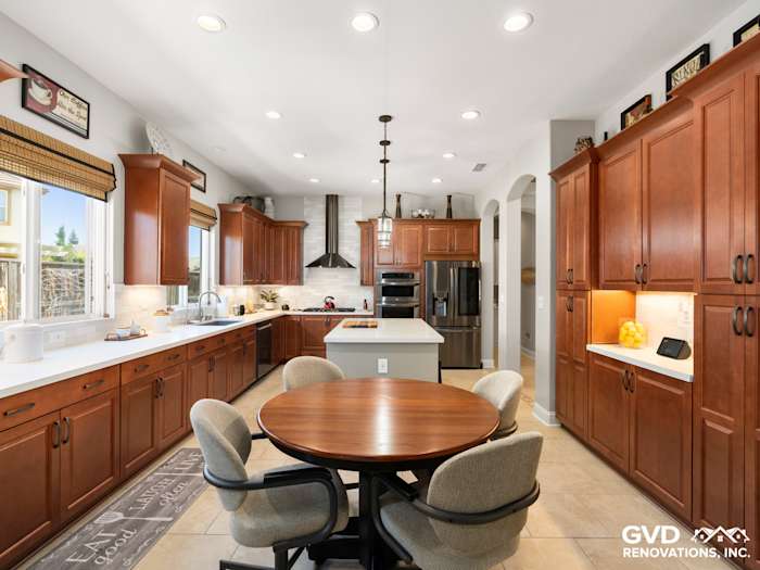 Bright kitchen remodel in Elk Grove featuring custom wood cabinets, quartz countertops, and modern appliances