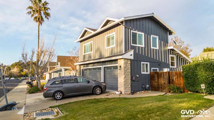 Home exterior featuring new James Hardie siding in Night Gray with Arctic White trim in Dublin, CA