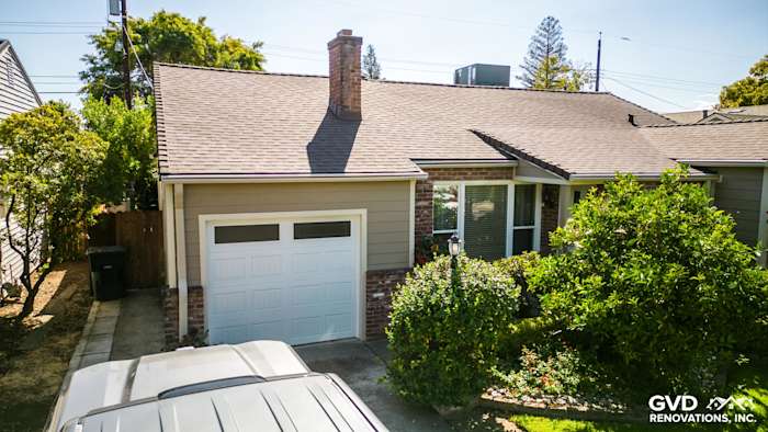 Fresh Khaki Brown James Hardie siding on a modern Sacramento home exterior with lush green landscaping