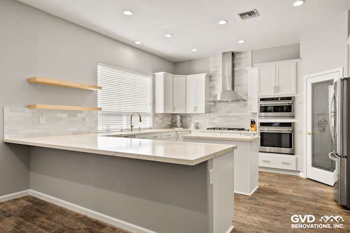 Modern kitchen remodel in Roseville with Diamond cabinets, MSI countertops, and a full-height tile backsplash