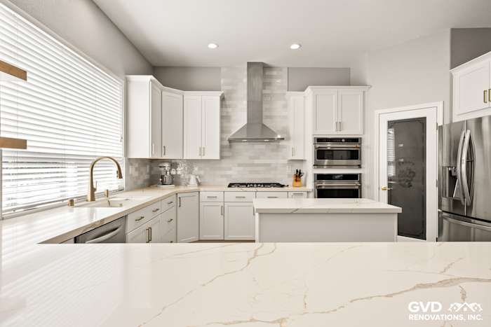 Bright modern kitchen featuring Diamond cabinets, MSI quartz countertops, and a sleek backsplash in Roseville, CA
