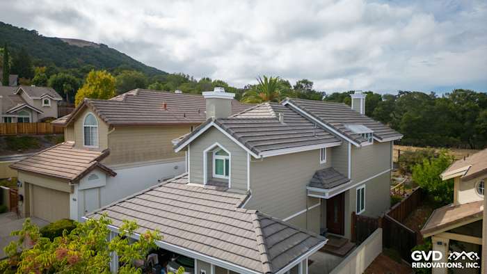 CedarMill 8 1/4" Monterey Taupe James Hardie siding and Arctic White trim on a Danville home