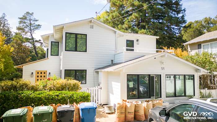 Newly installed James Hardie Arctic White siding on a modern Orinda home with large windows and landscaping