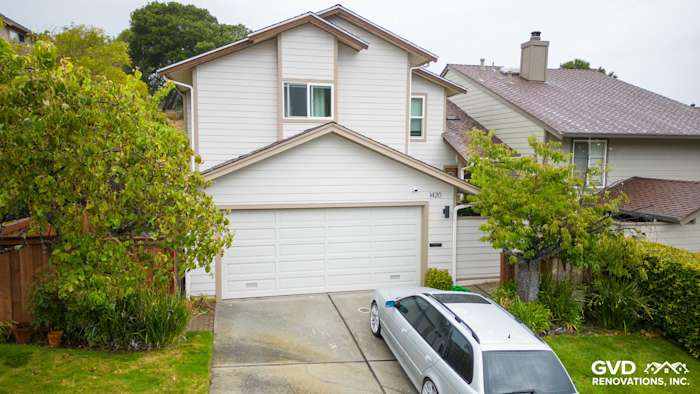 Two-story home in San Mateo with Cobble Stone James Hardie siding and Khaki Brown trim, showcasing modern renovations