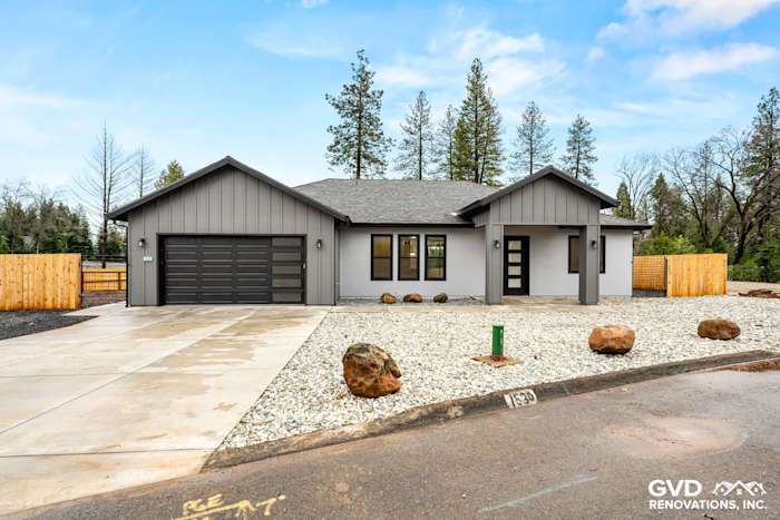 New construction home in Paradise featuring James Hardie Architectural Panels in Sea Grass and black Milgard windows