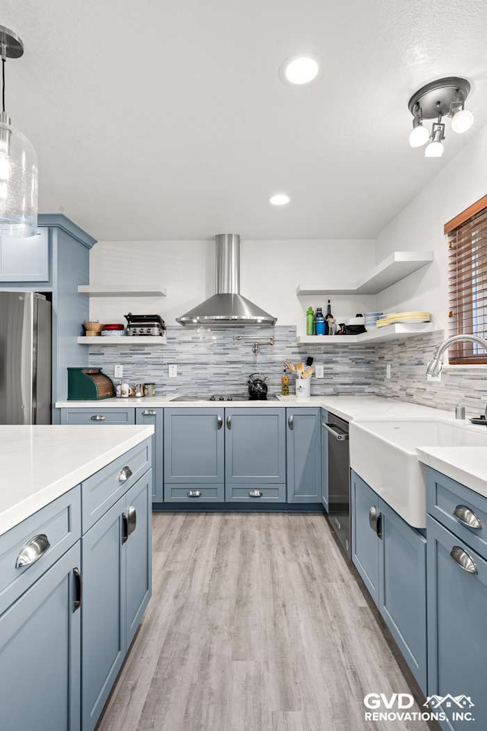 Modern kitchen in Elk Grove featuring Waypoint cabinets, MSI Calacatta Ultra countertops, and a linear backsplash