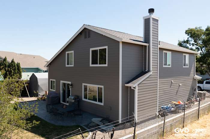 Charming home exterior featuring James Hardie Aged Pewter siding and Arctic White trim in Rohnert Park