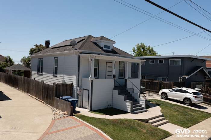 Modern San Leandro home with James Hardie Arctic White siding and trim, showcasing a clean, updated exterior