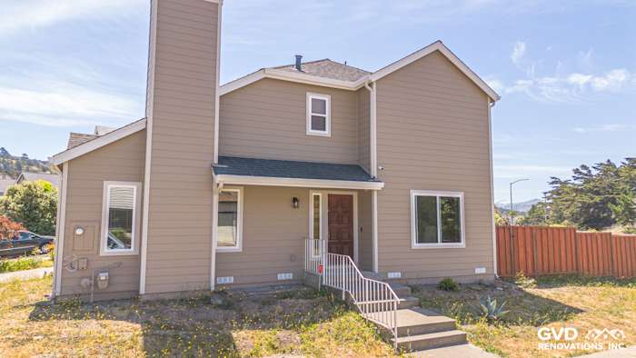 Pacifica home featuring James Hardie khaki brown siding, Anlin windows, and Cobble Stone trim