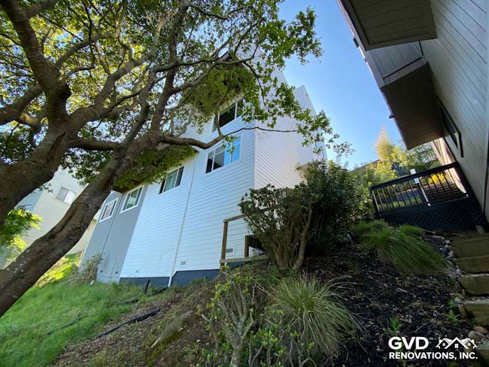 Newly installed James Hardie lap siding on home exterior, surrounded by landscaping and trees in Mill Valley, CA