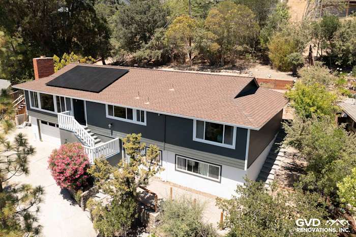 San Rafael home featuring James Hardie Iron Gray siding and Arctic White trim, solar panels on roof