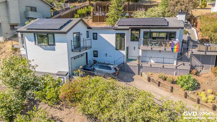 Modern home exterior featuring James Hardie Arctic White siding and Anlin Catalina windows in San Rafael, CA