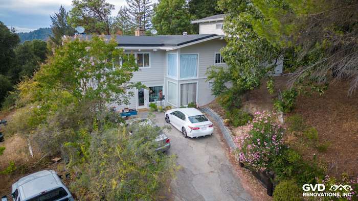 Home exterior featuring new Cobble Stone James Hardie siding and Arctic White trim in Los Gatos, CA