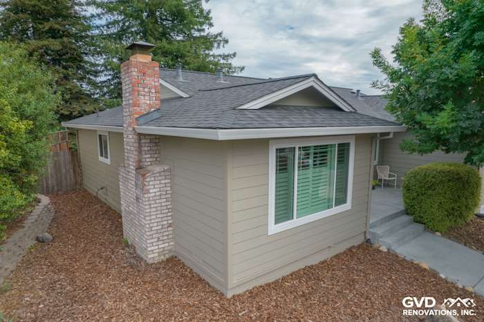 James Hardie Monterey Taupe siding with Arctic White trim and Anlin Catalina windows on home exterior in Petaluma