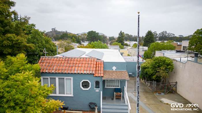 Brisbane home with Boothbay Blue HardiePlank siding and Arctic White trim, showcasing a modern exterior upgrade