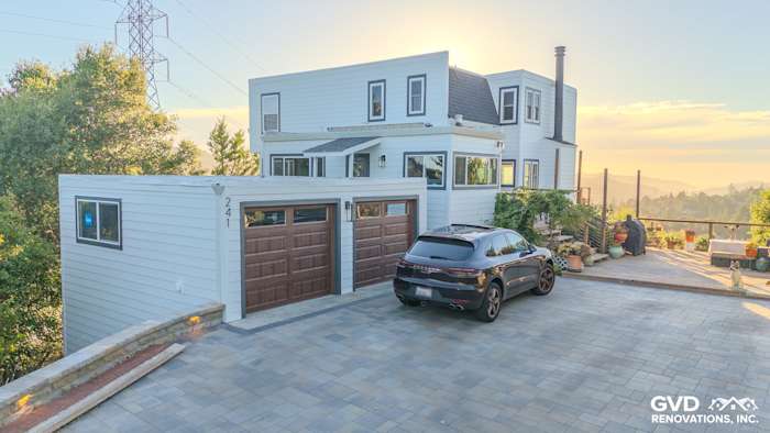 Modern home exterior in Orinda featuring James Hardie Color Lap Plank Siding in Arctic White and Anlin Windows