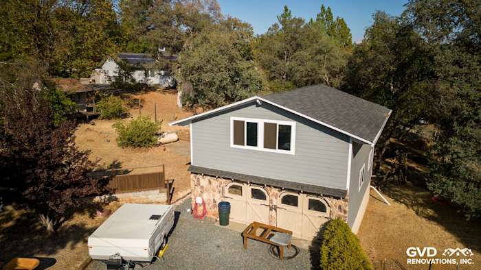 Updated home exterior showcasing Gray Slate James Hardie siding and Milgard windows in Meadow Vista, CA