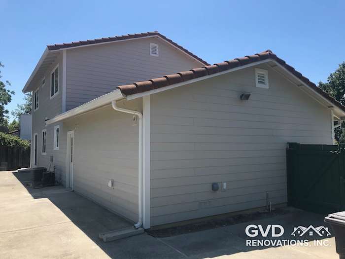 Arctic White James Hardie Lap Siding and Cobble Stone Soffit on a home exterior in Concord, CA