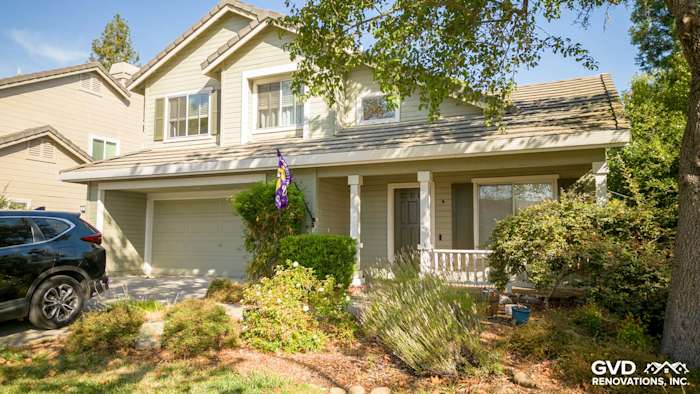 Elegant home exterior in Petaluma featuring Evening Blue HardiePlank siding and Milgard Tuscany windows