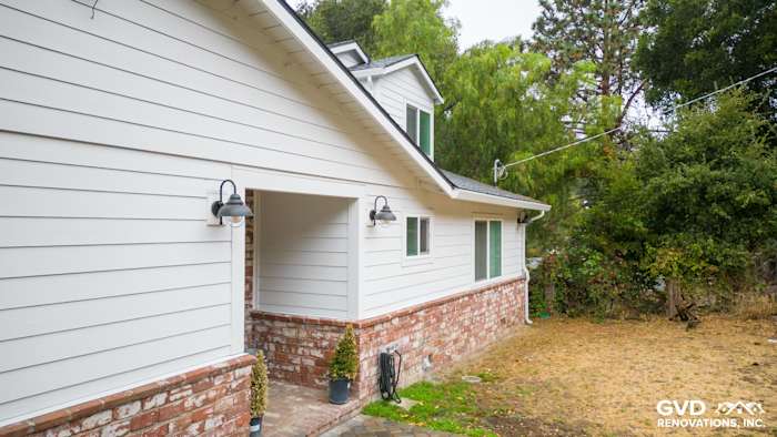 Freshly remodeled home exterior featuring James Hardie Cedarmill siding and Alside windows in Oakland, CA
