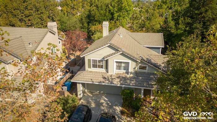 Elegant home exterior featuring James Hardie Evening Blue siding, Arctic White trim, and Milgard Tuscany windows in Petaluma