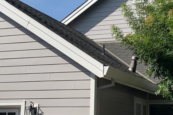 Updated home exterior featuring Pearl Gray James Hardie siding and Arctic White trim in Napa, CA