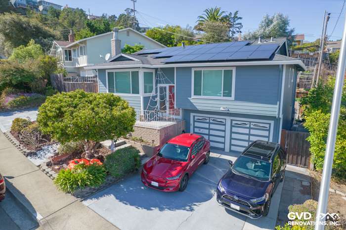 Coastal home exterior in San Bruno, featuring Boothbay Blue HardiePlank siding and Arctic White trim