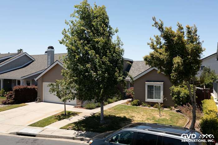 Foster City home featuring James Hardie Artisan Lap Siding in Khaki Brown and Arctic White trim