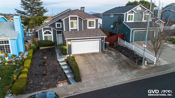 Modern home exterior featuring James Hardie Evening Blue siding and Arctic White trim in Vallejo, CA