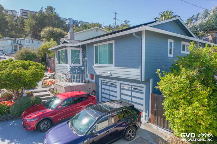 Coastal-style home exterior featuring Boothbay Blue HardiePlank siding and Arctic White trim in San Bruno, CA