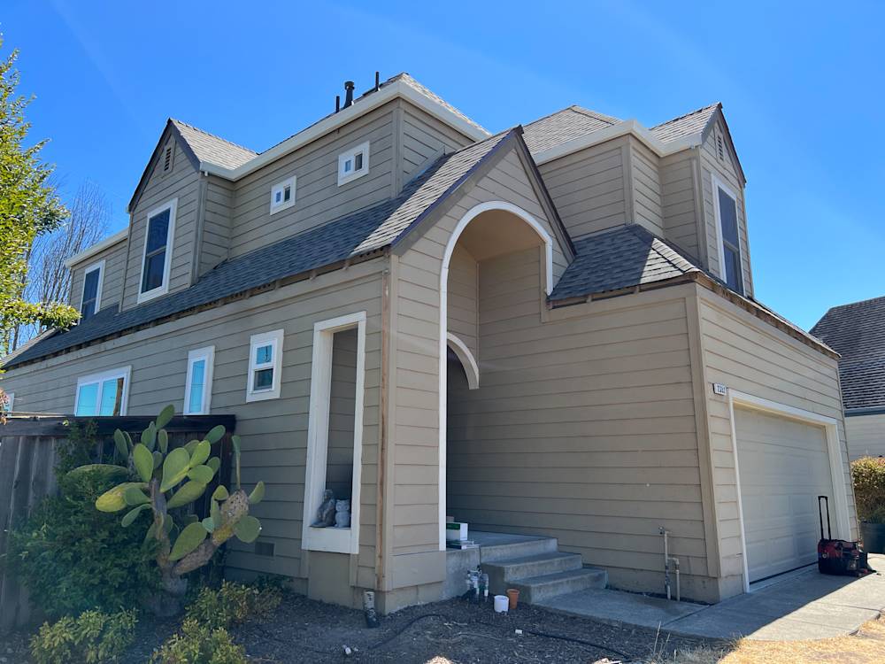 Tan exterior with steep rooflines and angular architecture in Sacramento neighborhood