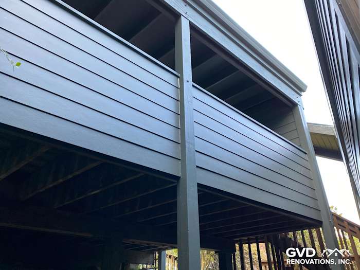 James Hardie fiber cement siding in dark gray on a Mill Valley home’s deck area