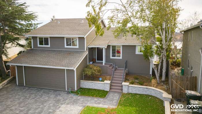 Traditional home exterior featuring Timber Bark HardiePlank siding, Arctic White trim, and landscaped entryway in Benicia