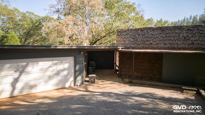 Iron Gray James HardiePlank siding on Meadow Vista home exterior with unique shingled roof