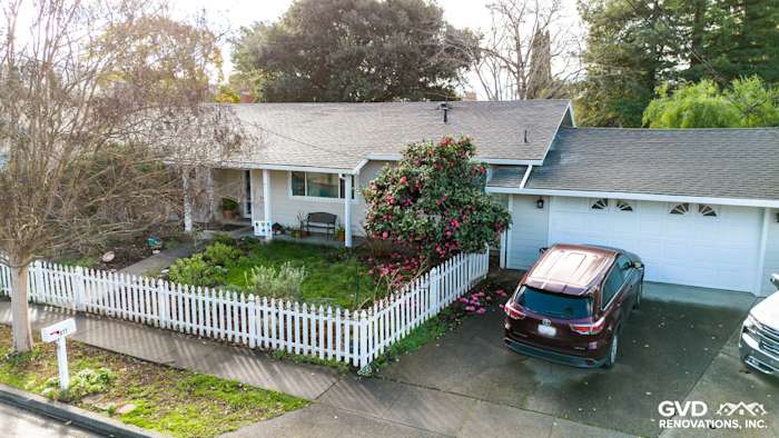 Charming Napa home featuring newly installed James Hardie siding and Anlin windows, surrounded by landscaped garden