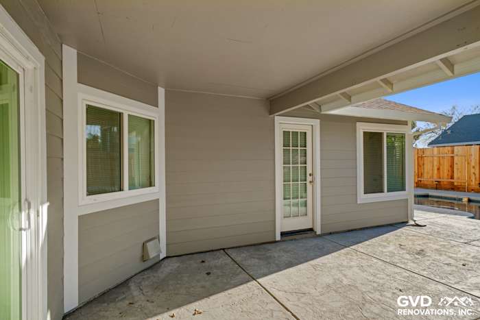 Monterey Taupe James Hardie siding with Arctic White trim on a Folsom home's exterior