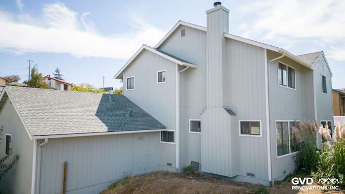 New light gray James Hardie siding and Milgard Trinsic windows on a modern El Sobrante home exterior