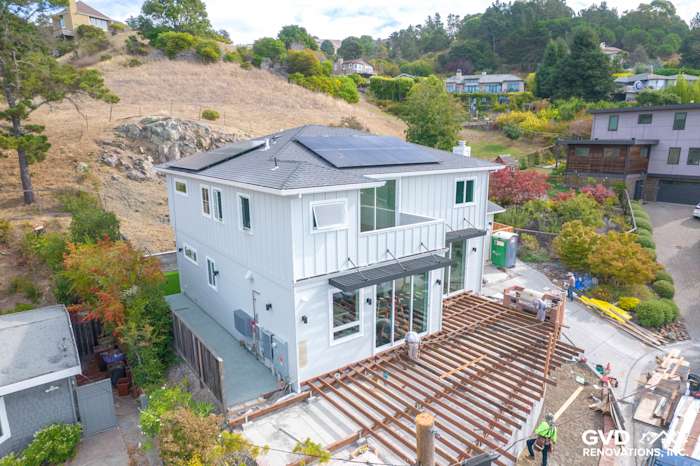 Modern home exterior featuring James Hardie Artisan Lap Siding, solar panels, and a newly upgraded deck in Tiburon, CA