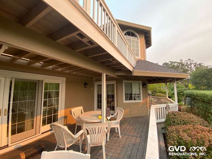Beautiful home exterior featuring Khaki Brown James Hardie siding and trim with spacious deck and seating area